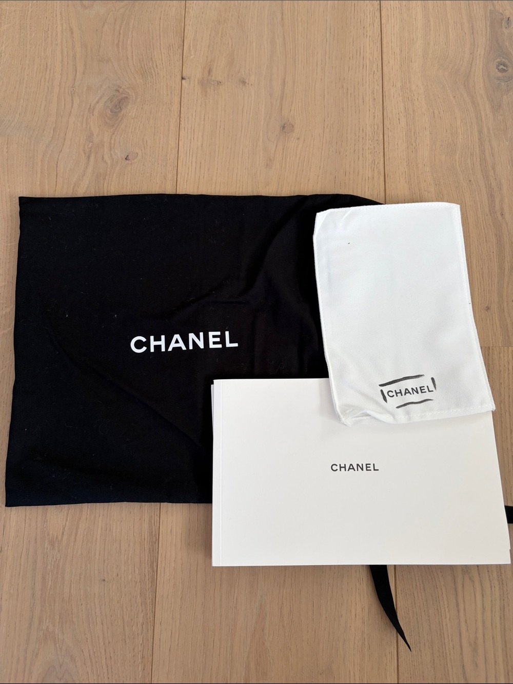 Chanel dust bag and care book